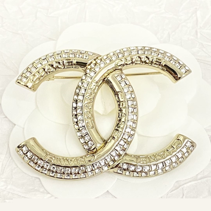 Ch*el brooches